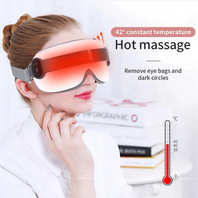Massagista de olhos portátil com música de calor Airbag térmico recarregável de compressão N.W. 42g